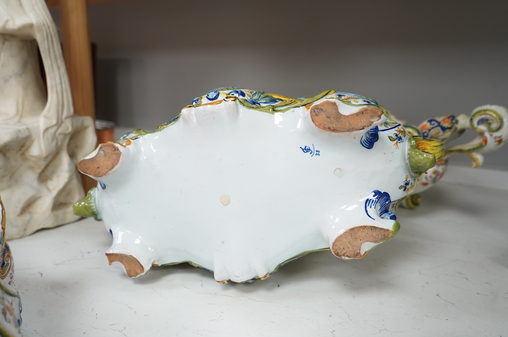 Three French faience planters, one marked Rouen, largest 50cm wide